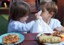 adorable child helps friend clean up