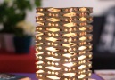 A lampshade made from clothespins