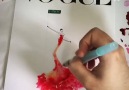 Artist uses paint and water drops to create spontaneous dress designs