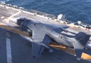 AV-8B Harrier uçaklarının uçak gemisine dikey inişi...