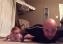Babasıyla antreman yapmaya çalışan sevimli bebek :)