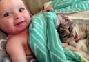 Baby Can't Stop Petting Her First Kitten