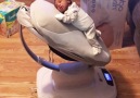 Baby falls asleep on rocking machineCredit JukinVideo