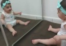 Baby in front of the mirror