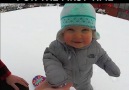 Baby snowboards for the first time