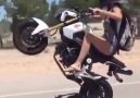 Beautiful Girl Doing Motorcycle Stunts