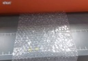 Bubble Wrap Going Through A Laminating Machine Is So Satisfying