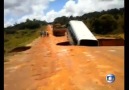 Bus Topples Into Crater, Swept Away by Floodwaters