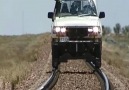 Car On Railroad Tracks