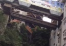 Commuter train cuts through Chinese apartment building!!! This is awesome !