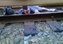 Crazy Kid Under Moving Train Escapes Between Wheels