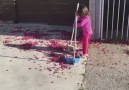 Cute Tot Helps Sister Clean Yard