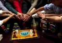 Cutting the cake at our final dinner