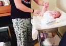 Dad changes nappy