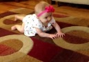 Dog Teaches Baby To Crawl  :)