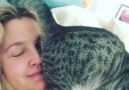 Drew Barrymore demonstrates the essence of cat lady life with her kitty Fern