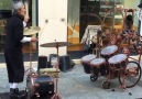 Drum Juggling Street Performer