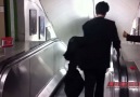 Drunk Man Wrong Way on the Escalator Credit LPE360