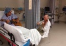 Dr William Sloan plays a duet with his patient Sergio Vigilato.