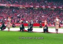 Emirates crew demonstrates "safety video" on a football field ...