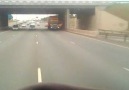 Freeway horror..... hijacker hangs on the door of a speeding truck