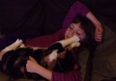Funny Cat Kneads Girl's Face