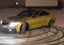 Girl Drifting her gorgeous gold BMW M4 in the snow Amazing skills