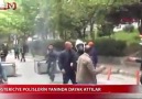 Göstericiye polislerin arasında dayak attılar !