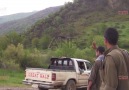 Guerrillas hand over the slain civilian to family in Amadia