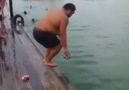 Guy Jumps Into Water, Ball Goes Flying