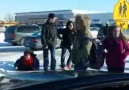 Guy watches kids slip on Ice and Laughs! LOL