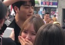 180327 Junhoe giving free hugs() in Hongdae