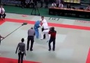 Karate referee gets into the fight