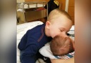 Kent meeting his new little brother Noah for the first time...Credit Newsflare