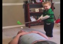 Kid Fails To Hit Golf Ball Out Dad's Mouth