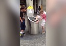 Kid Gets Stuck in Trash Bin