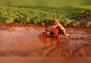 Kid Plays In The Mud