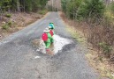 Kids Run Through Puddle