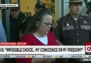 Kim Davis tearfully returns to work