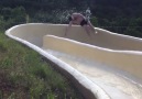 Lad Is Catapulted Down Hill From Waterslide