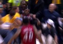 LeBron James falls into Shaq's lap !