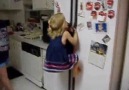 Little Girl Easily Climbs Fridge