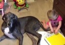 Little Girl paints with dog's tail