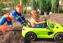 Nikita ride on childrens car and stuck in the ground Vlad tows on the tractor