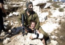 Palestinian Boy Held in Headlock