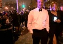 Protesters throw water on inaugural ball attendees heading int...