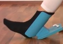 Put on socks without bending down