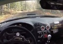 Rally almost runs over camera man