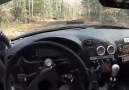 Rally car runs into camera man
