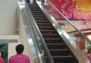 Rat gets stuck on an escalator